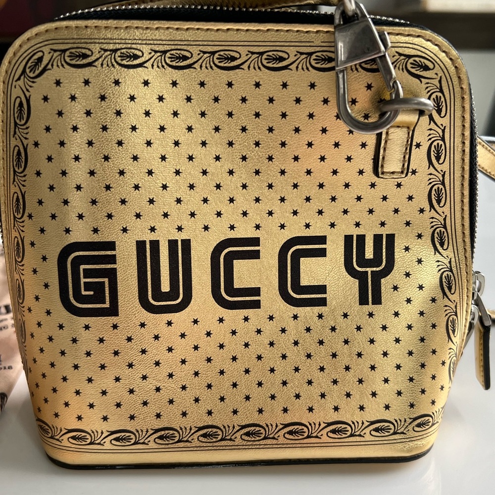 Gucci x Sega Guccy Stars Mini Dome Gold Calfskin Crossbody Bag
Keeper bag & box
